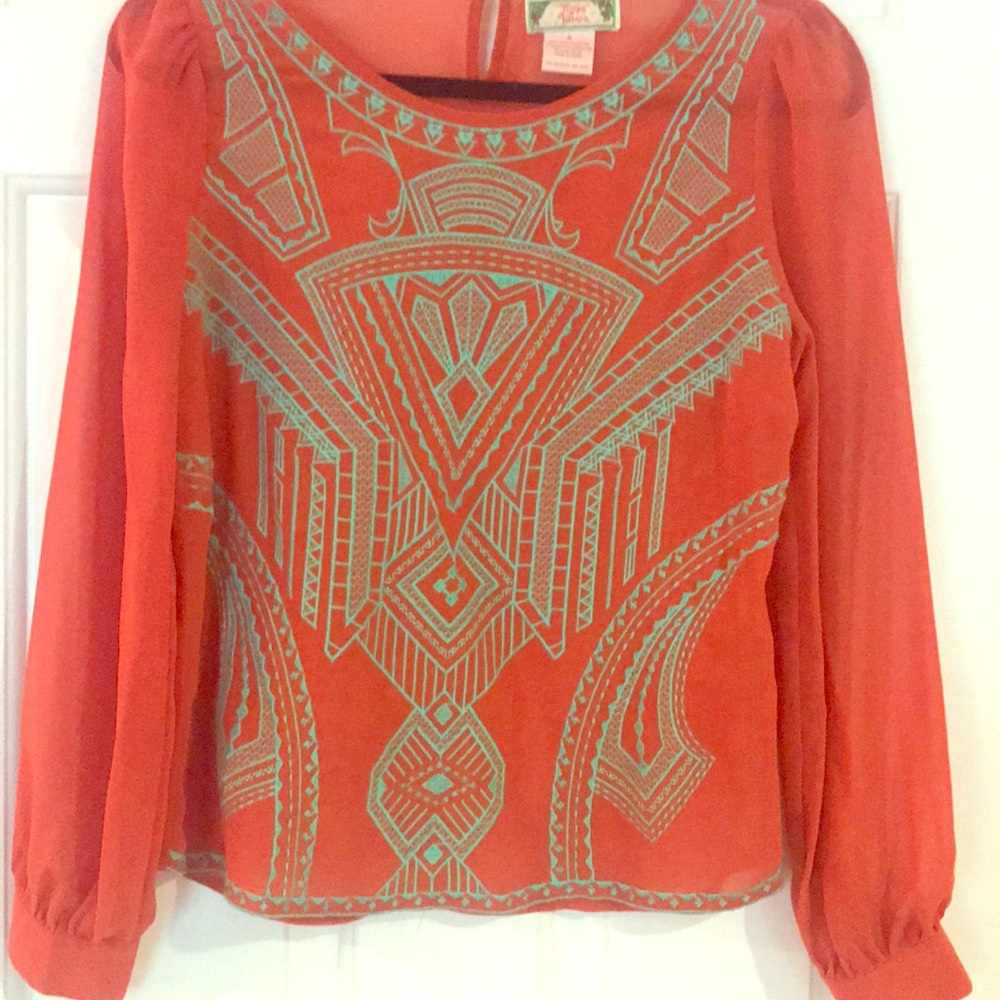 Orange shirt with embroidery